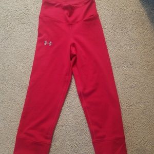 Under Armour heat gear leggings.  Pink w/ silver